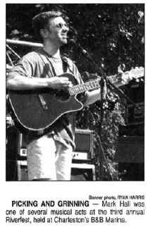 Riverfest, Charleston, TN, 2002.  More like "Strumming & Grimacing" than "Picking and Grinning."  Click to see larger version.
